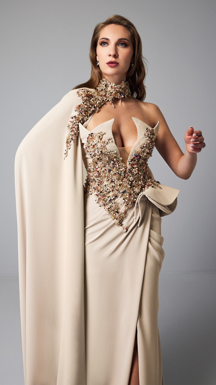 Embellished Beige Evening Gown with Dramatic Cape